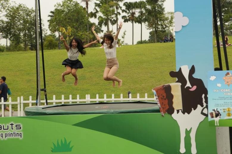 people jumping on a trampoline